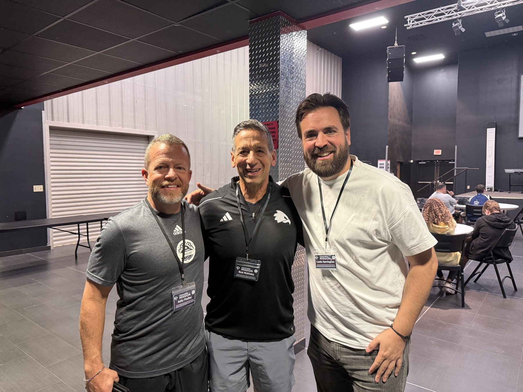Louis Harrington with head coaches
